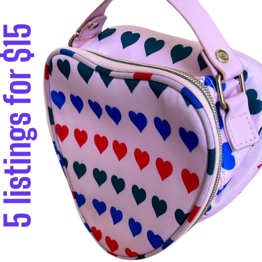 Like new Estee Lauder Heart Shaped Zip Cosmetic Bag with handle